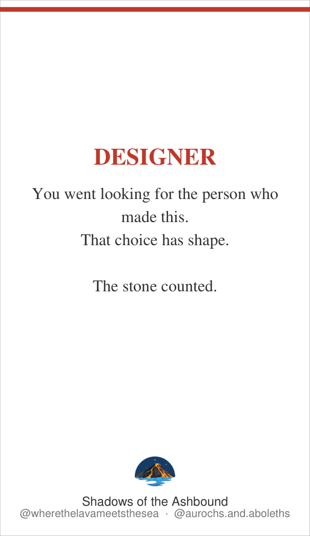 Business card front, reading DESIGNER